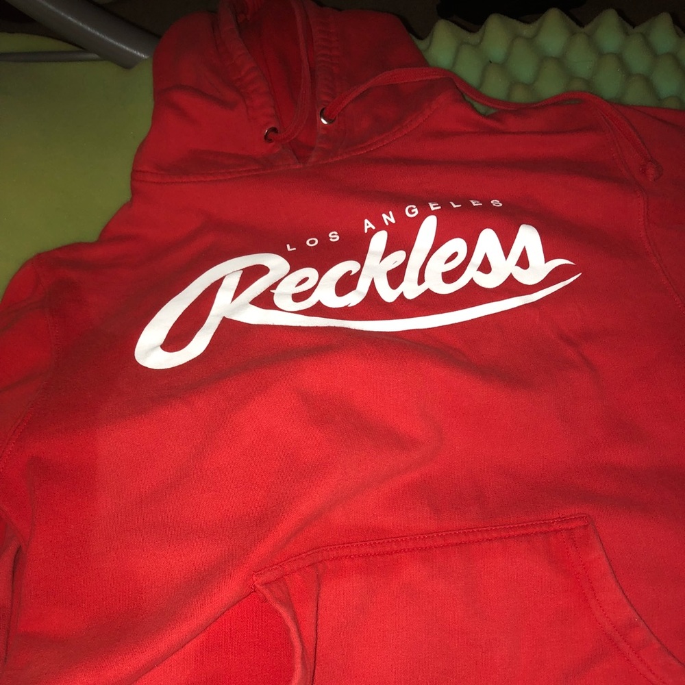 Young and reckless sweater